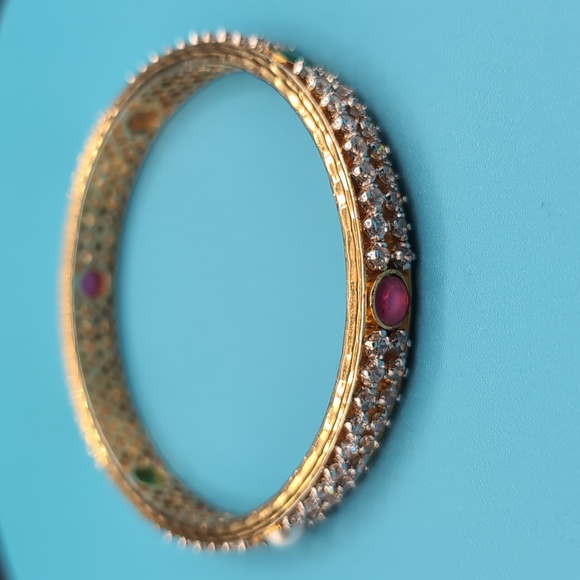 Gold Toned Textured Pattern Bracelet With Rubies And Coloured Faceted Stones - Picture 5 of 10